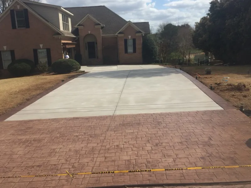 Picture-frame border stamped concrete driveway installed in Charlotte, NC by Stamped Concrete Artisans
