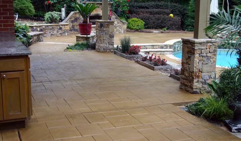 Resurfaced stamped concrete pool deck installed in Charlotte, NC by Stamped Concrete Artisans