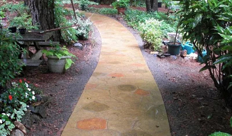 Random stone pattern stamped concrete walkway installed in Charlotte, NC by Stamped Concrete Artisans
