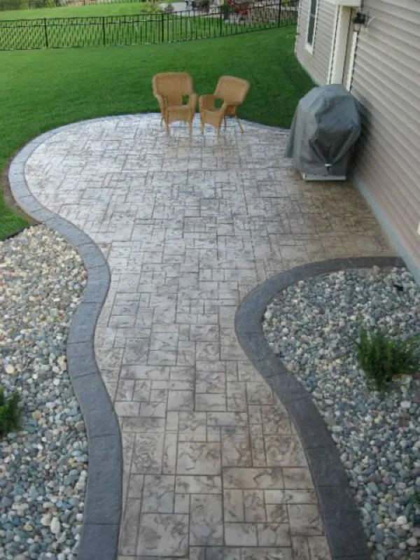 Two-tone stained concrete finish detail installed in Charlotte, NC by Stamped Concrete Artisans